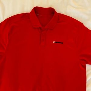 Men’s Under Armor polo with Wiseco piston logo